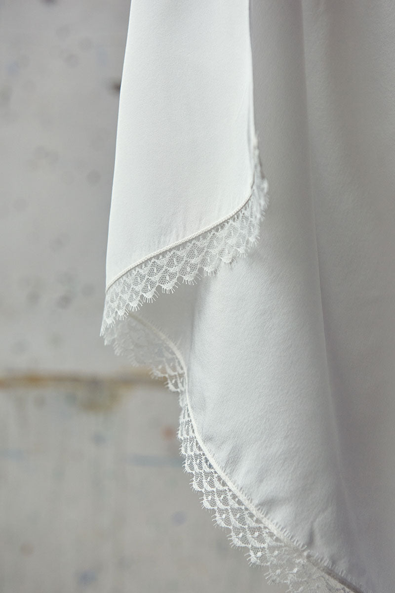Silk stole with lace trim